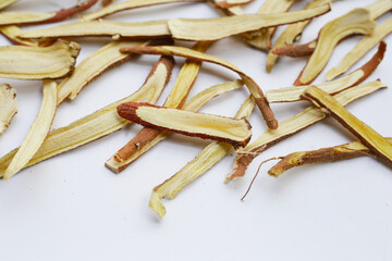 Liquorice sliced on white background.