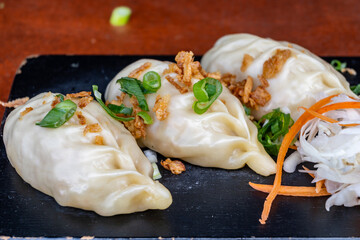 Asian food, steamed cooked filled gyoza dumplings
