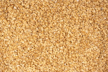 Oat-flakes as a background. Top view.