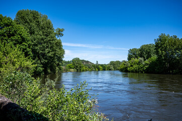Driving along Dordogne river near   .La Roque-Gageac village located in Dordogne department in southwestern France