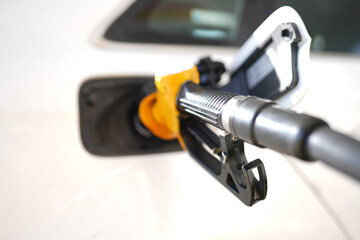 A car is being filled with gas at a gas station