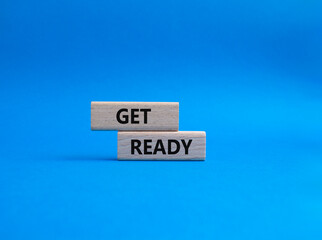 Get ready symbol. Wooden blocks with words Get ready. Beautiful blue background. Business and Get ready concept. Copy space.