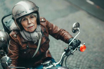 Obraz premium Overhead, Top Angle High View of Elderly Woman Riding Speedy Motorbike with Fear and Panic