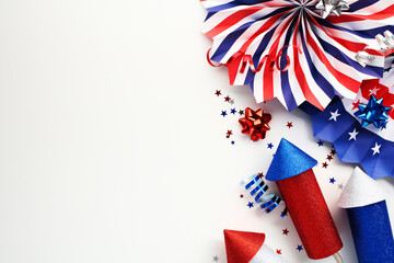 Obraz premium USA federal holiday banner design. Flat lay composition with American flag color paper fans and firework rockets on white background. Happy Independence day, Presidents Day, Labor day concept.