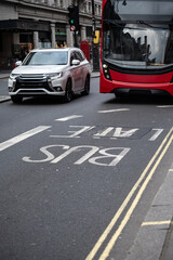 Transportation in London city, roads, road signes, street signes, warnings, indicating of directions in Great Britain, city life in England