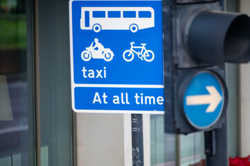 Fototapeta premium Transportation in London city, roads, road signes, street signes, warnings, indicating of directions in Great Britain, city life in England