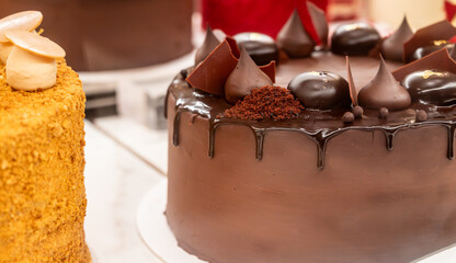 Classic chocolate biscuit cake with white whipped butter cream