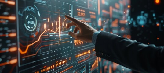 Businessman interacting with virtual data: Futuristic business technology on a blurry dark background
