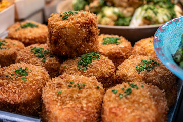 Fishcake with crab meat, prawns and salmon fish in breadcrumbs
