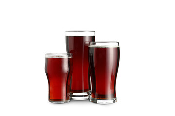 Glasses of tasty kvass on white background