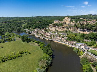 Beynac-et-Cazenac village located in Dordogne department in southwestern France with medieval Chateau de Beynac, one of most beautiful villages of France, aerial view