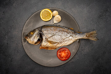 Uncooked fish on a baking tray