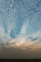 Golden Sunset Behind Clouds