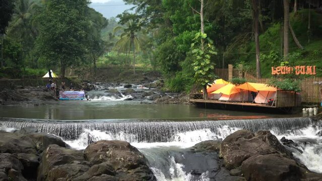 Camping on the banks of the Coorg Loibumi river in Sarang