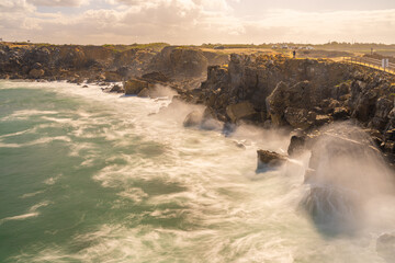 Rugged Cliffs of Ilh&eacute;u da Papoa with Crashing Waves, Portugal