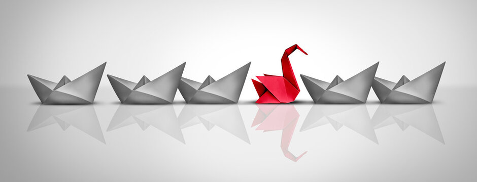 Extraordinary Skill as an Independent thinker in a group of ordinary paper boats with an exceptional origami swan representing excellence and being a nonconformist.