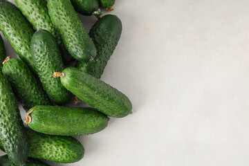 Fresh green cucumbers on white background