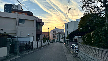 sunset over a narrow residential city street - Nagoya, Japan