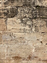 Aged Stone Wall textured surface of an aged stone wall