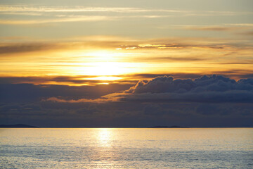 Sunset on a beach on the isle of Iona. Iona is a small island of the Inner Hebrides in the west of Scotland.	