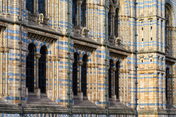 Detail of colorful brickwork of London Natural History Museum facade