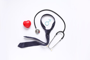 Stethoscope, tie, heart and male sign isolated on white background. Prostate cancer awareness