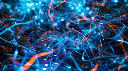 A closeup of a twisted and tangled of electroluminescent wire resembling a chaotic and otherworldly matrix of light