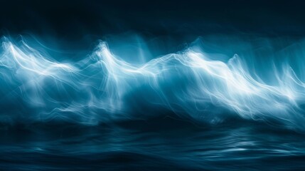 Delicate wave crests captured in soft focus their luminescent glow resembling a celestial dance in a dark ocean
