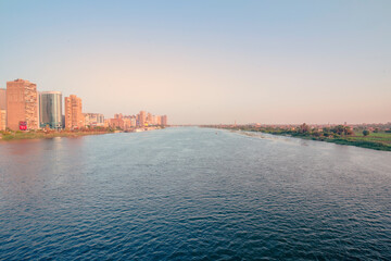 Nile River View, Cairo, Egypt, Buildings on the Left Bank and Green Fields on the Right Bank