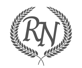 Initial letter R and N, RN monogram logo design with laurel wreath. Luxury calligraphy font.