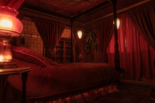 This image shows the interior design of a red victorian, bordello themed bedroom, facing a dramatic the poster bed.