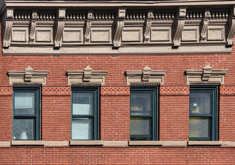 jersey city brownstone building detail (historic pre-war red brick buildings with power lines)...