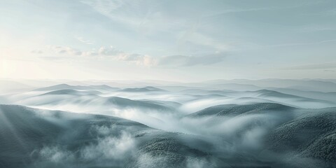 Fototapeta premium Fog creates an atmosphere of otherworldly calm, offering a panoramic view of rolling hills shrouded in mist, creating an ethereal and peaceful ambiance with gentle diffused light.