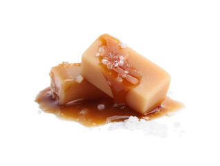 Yummy caramel candies and sea salt isolated on white