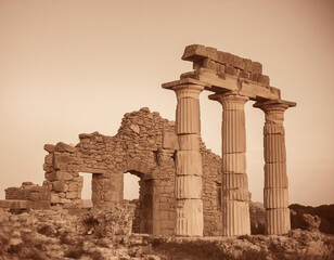 ruins of ancient roman temple in sepia toned, vintage effect