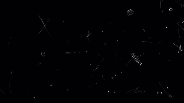 White chaotic scratches on a black screen. Stock video with retro film in 4K with alpha channel. Old movie effect for overlay.