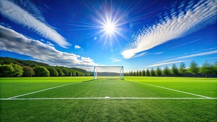 Soccer field under clear blue sky with sun shining brightly , soccer field, sport, outdoor, grass, blue sky, sunlight, sunny day, recreational, competition, match, goal, game, equipment
