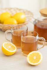 cup of black tea with lemon - close up