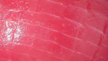 Behold the exquisite beauty of sashimi-grade tuna, its luscious pink flesh tantalizing the senses....