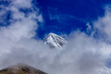 Himalaya mountains landscape with high altitude snow and ice glacier summit peaks. Everest Base Camp Solo Khumbu trekking region in Nepal. Beautiful Himalayas eight thouthander summits under blue sky