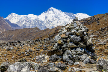 Himalaya mountains landscape with high altitude snow and ice glacier summit peaks. Everest Base Camp Solo Khumbu trekking region in Nepal. Beautiful Himalayas eight thouthander summits under blue sky