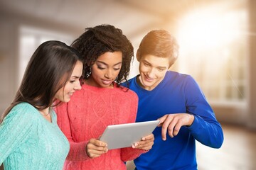 Group of  businesspeople standing with papers in office together