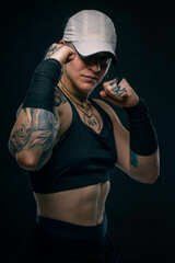 Tough Blonde Boxer Girl with Muscular Physique and Fitness