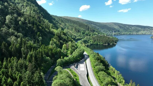 Aerial footage of control station on highway E16 at Romslo, Norway, monitoring trucks and buses to city of Bergen