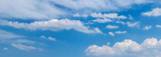 Banner Tropical summer blue sky fluffy white cloud summertime on light sunny day cloudscape. Panoramic Clear bright blue skyline spring sunlight climate background. Heaven blue ecology for web banner