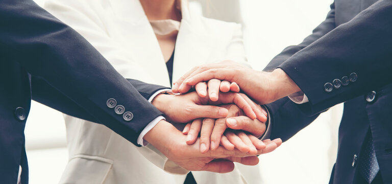Banner Partners hands together teamwork group of business people meeting in firm company office. Panorama Diversity Hands join empower partner teams connection Mergers acquisitions social community