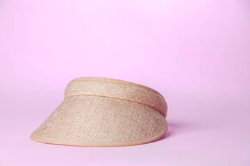 Visor on pink background. Visor concept. Feminine product concept. Copy space.