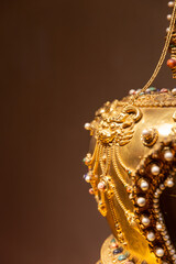 golden Tibetan Buddhist pagoda with gems