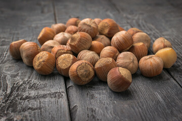 Close-Up of Fresh Hazel Nuts on Rustic Wooden Surface for Autumn Food Photography