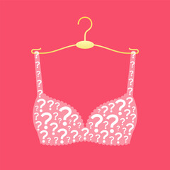 Brassiere made from question mark symbols on clothes hanger